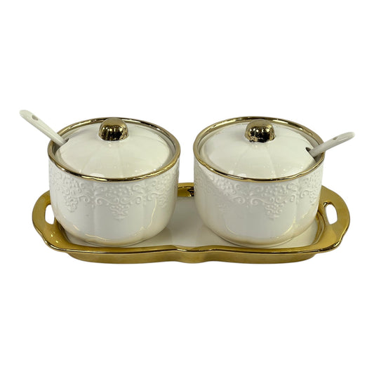 Golden and white teapot